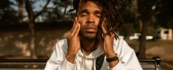 Man on bench feeling stressed