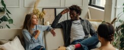 Couple discussing with each other in counselling